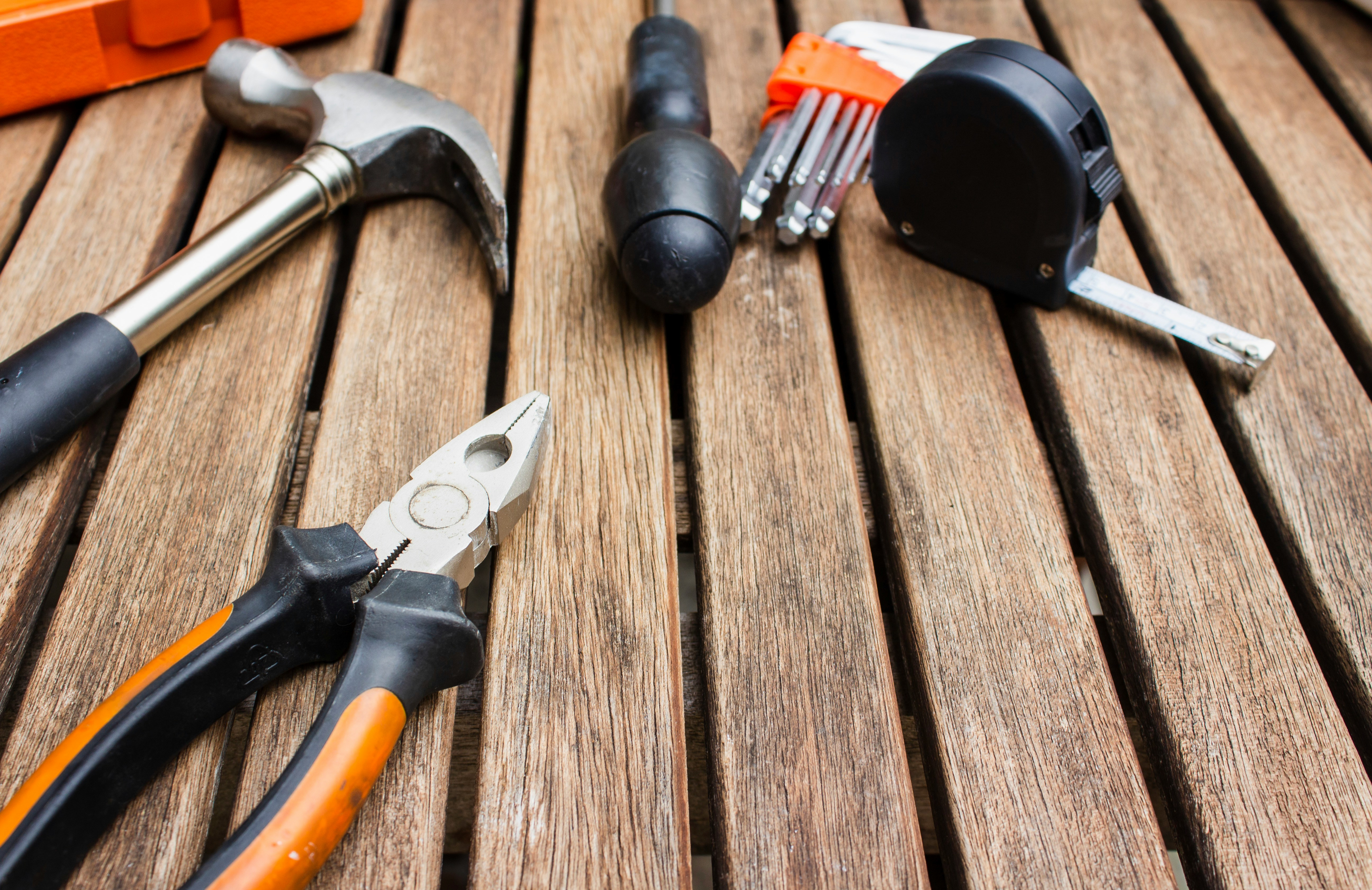 Essential Homeowner Tools for Safe Maintenance and Inspection 1 Basic homeowner hand tools arranged for maintenance